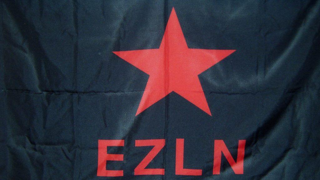 Flag of the EZLN 1024x576 - Discours du Sous-Commandant Marcos à son Disciple sur les Barricades